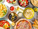 Mediterranean foods including Hummus, Olives, Tortellini, Caprese Salad and more.