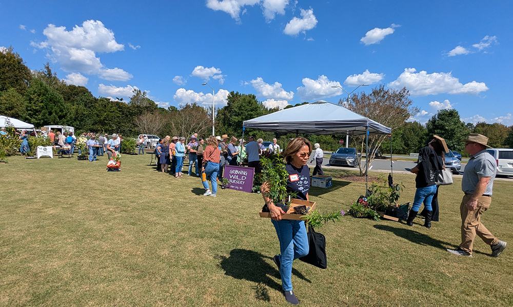 Lots of smiling faces at the native plant sale!
