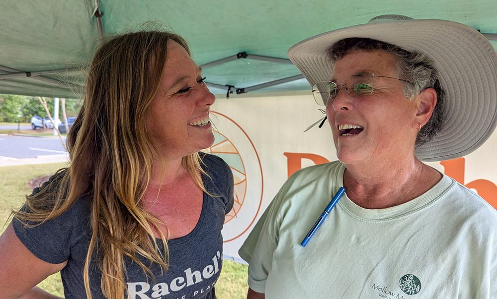 Growers Rachel Nelms (left) of Rachel's Native Plants and Sharon Day of Mellow Marsh Farm celebrate a successful plant sale!