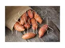 Sweet potatoes spilling from burlap sack on wooden surface; overlaid text "CANNER SWEET POTATOS"