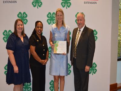 Coleman Killinger, 4-H Youth Development Agent, Receiving Achievement Awards