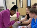 Using glo germ to find bacteria on hands