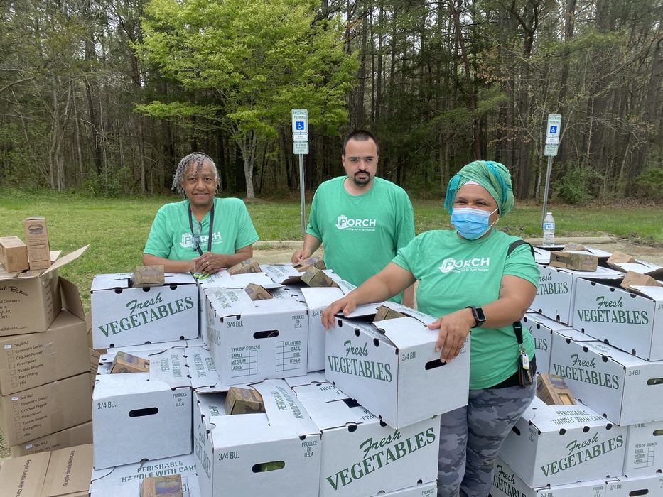 Volunteers with pallet of vegetables at a PORCH Hillsborough distribution event.
