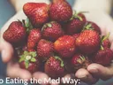 Hands holding a handful of strawberries; text: "Steps to Eating the Med Way:"