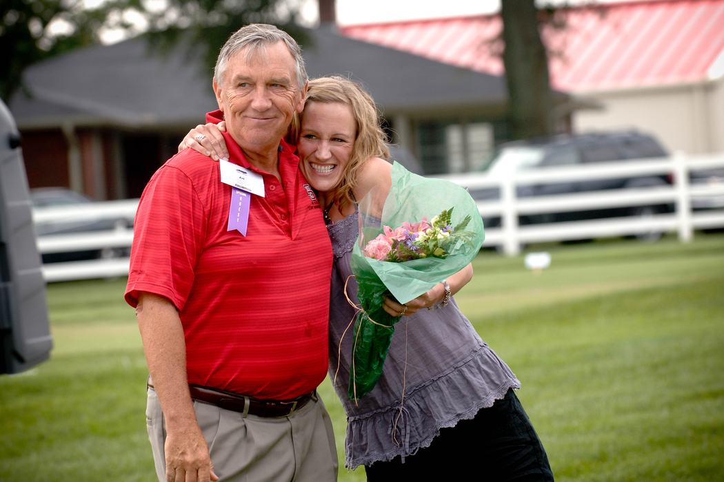Bruneau and his daughter pose together.
