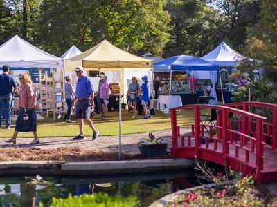 Artist booths on grand lawn in the New Hanover County Arboretum - Provided by New Hanover County