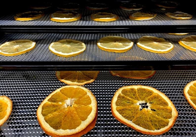 Citrus on a dehydration rack.