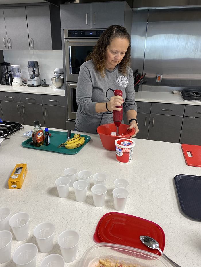 Chrissy making dessert recipe