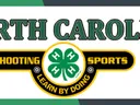North Carolina 4-H Shooting Sports logo with 4-leaf clover and text "Learn by Doing"