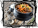 Vegetable stew in cast iron pot.