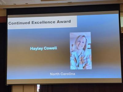Slide: Continued Excellence Award — Hayley Cowell; North Carolina; portrait of recipient.