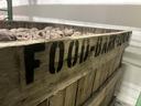 box with black text reading Food Bank CENC on the side