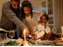 family around table for thanksgiving