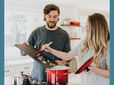 Image of a man and woman cooking together