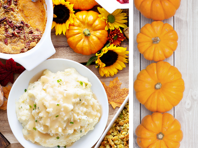 Happy thanksgiving on a background of foods and pumpkins