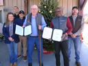 NCDA & NCSU License Agreement signing by NC Commissioner of Agriculture, Steve Troxler, and dean of the College of Natural Resources at NC State, Dr. Myron Floyd. From left to right pictured are, Upper Mountain Director, Teresa Lambert; director of NC Sta
