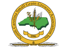 Seal with green NC map and wheat stalks; text "North Carolina Small Grain Growers Assoc." and "1986"