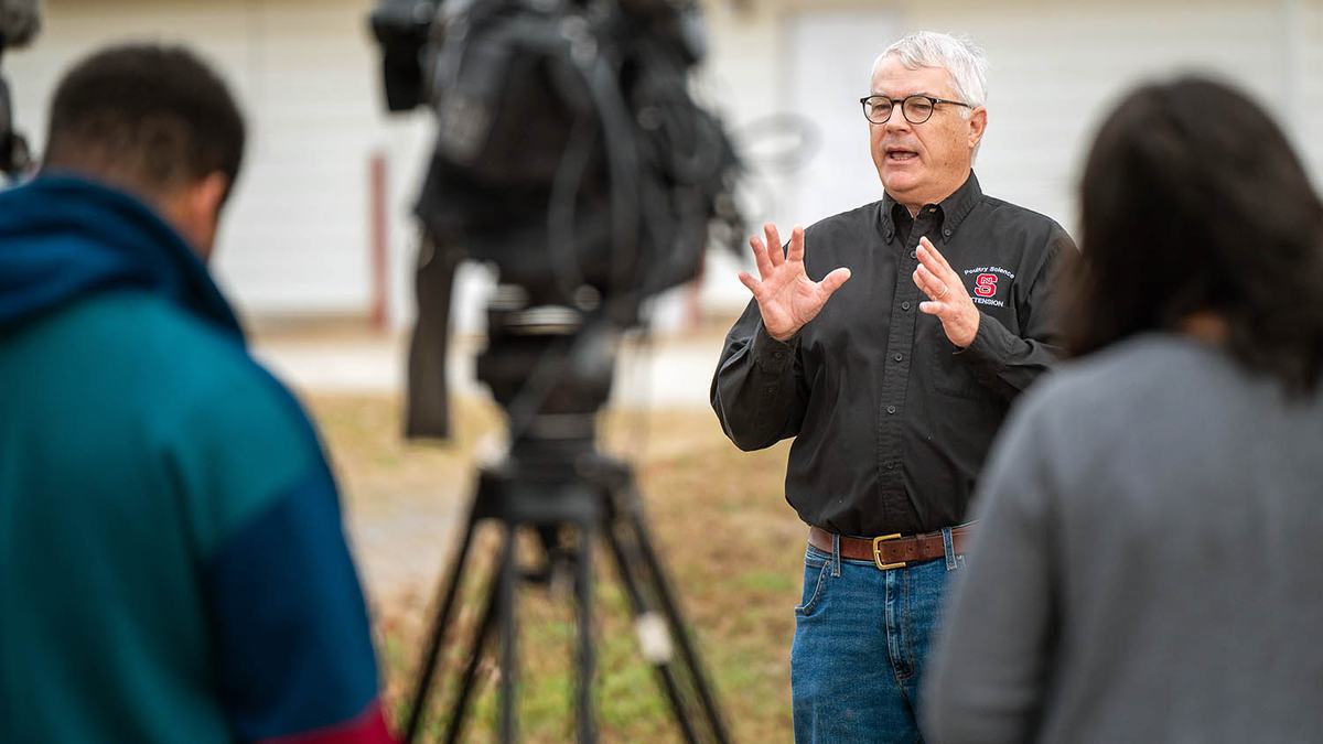 NC State Extension turkey specialist Jesse Grimes giving an interview