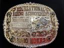 Ornate engraved belt buckle reading "Reserve Champion" and "2000 ROPERS"