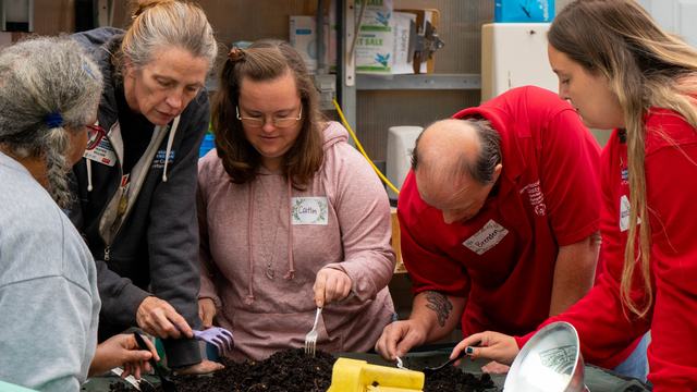 Participants in the Therapeutic Horticulture_s Open Community Social Group learn about Vermicomposting while getting hands-on experiences