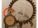 A steampunk montage includes watch parts, gears and a yellowed clipping with handwritten musical notes. An image from Pixabay by Creativemom.