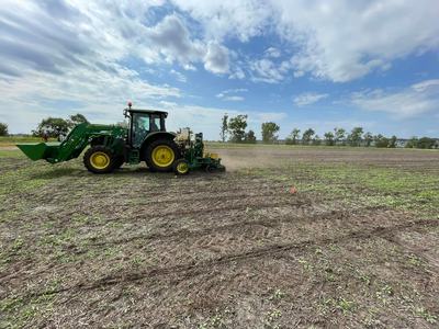 Tractor plowing a field