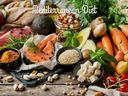Mediterranean Diet text over assorted foods: salmon, avocado, carrots, tomatoes, feta
