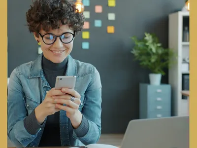 Lady using phone to order food using her SNAP benefits from her office.