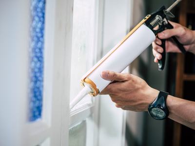 Caulking interior window.