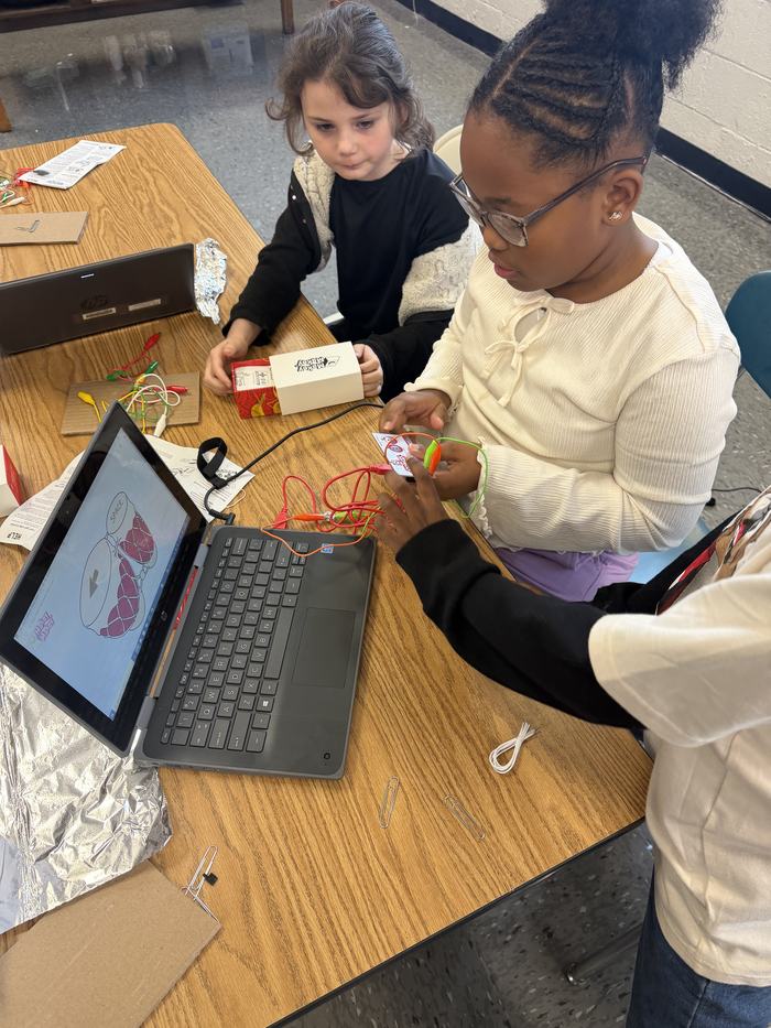 Youth using playing bongo's 