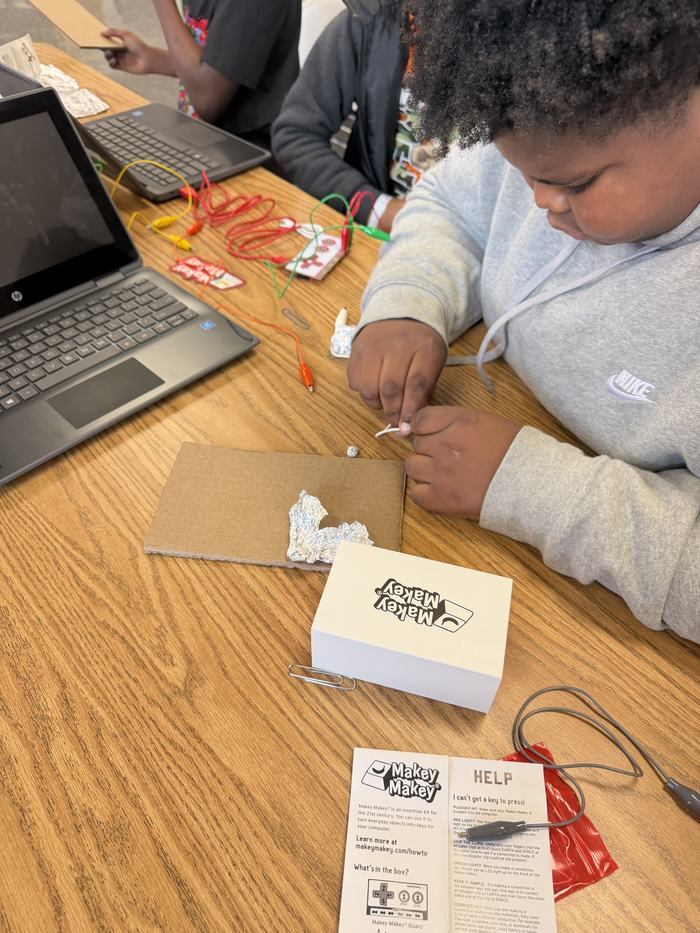 Youth testing household materials