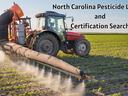 Tractor spraying a field