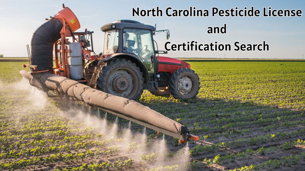 Tractor spraying a field