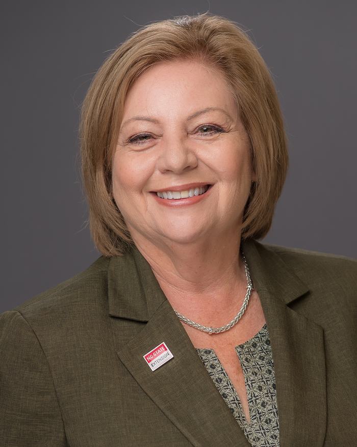 A headshot of Susan Kelly, who is retiring from the NC State Extension statewide leadership team