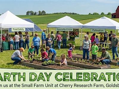 Earth Day Celebration banner; farm event with tents, people and children planting