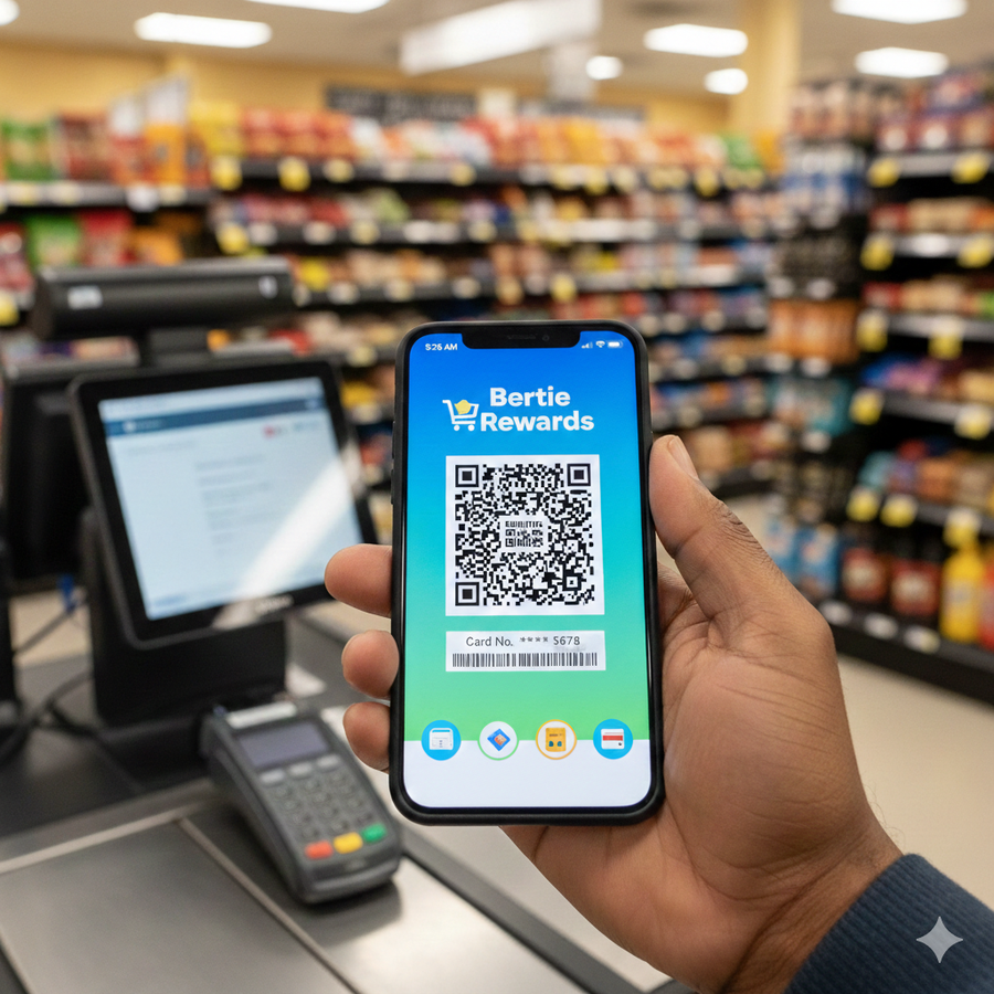 Hand holding a smartphone displaying a rewards program QR code at a supermarket checkout counter.