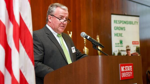 NC State Extension state 4-H program leader Mike Yoder speaking at a conference.