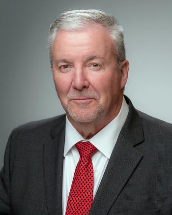 A headshot of Mike Yoder who is retiring as NC State Extension's statewide 4-H program leader