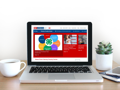 Laptop Screen open to New Extension Website Homepage