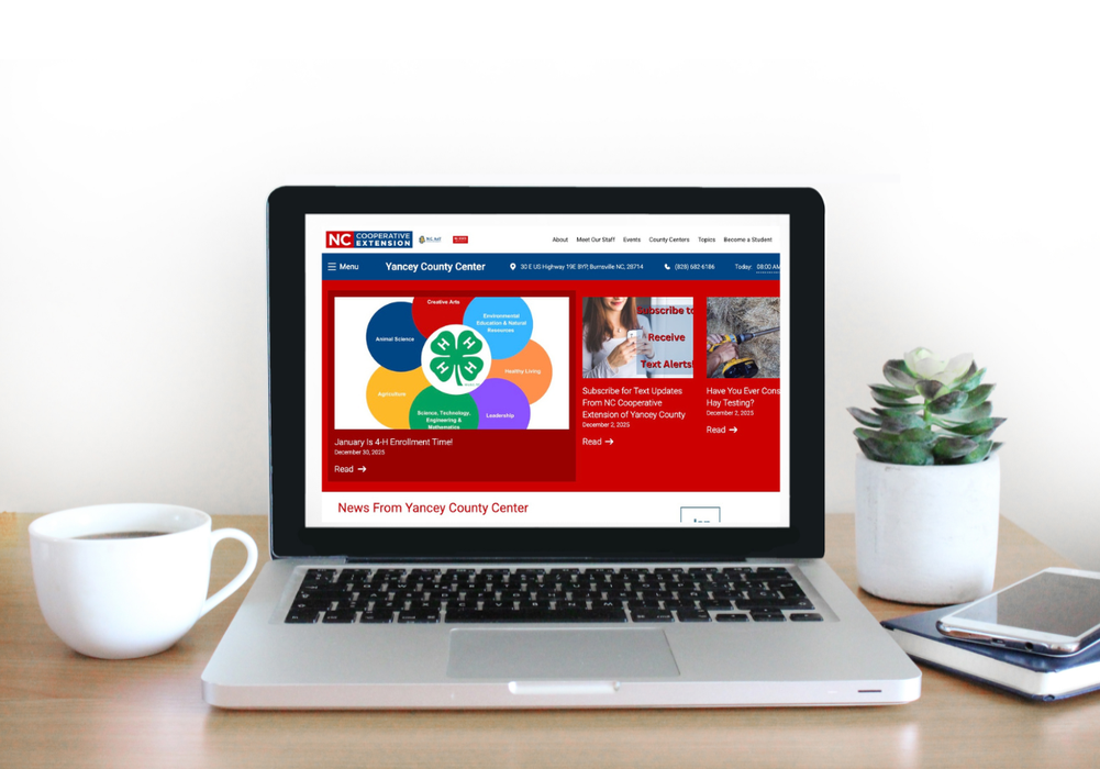 Laptop Screen open to New Extension Website Homepage