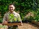 Family and Consumer Sciences program assistant Gaebryl Vives work at the Briggss Ave Community garden in Durham, NC. Its purpose is to provide an urban garden for Durham families to affordably grow healthy food, learn about sustainable agriculture, conser