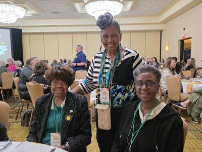 three women at table