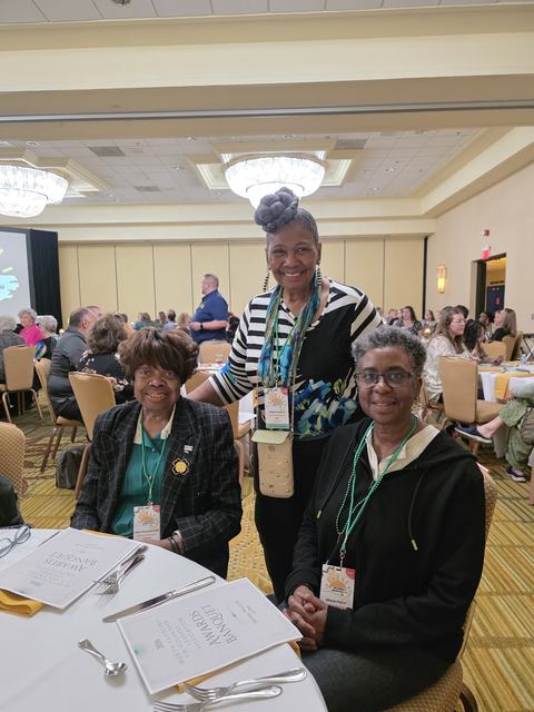three women at table