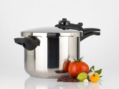 Pressure canner with tomatoes and peppers