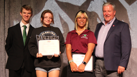 4-H member being honored with an award at 4-H Congress.