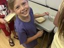 young girl smiling at camera