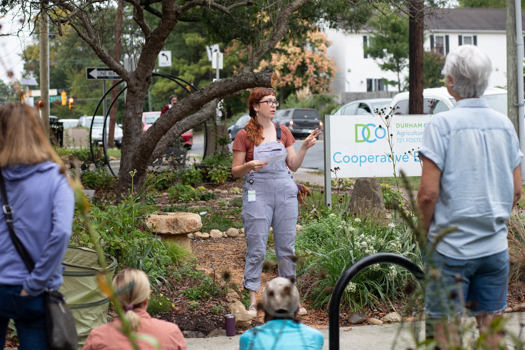 Horticulture agent Ashley Troth leads education of EMG volunteers in the demonstration garden at N.C. Cooperative Extension, Durham County Center.