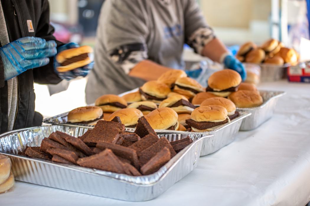 Vendor serving livermush at the North Carolina Liver Mush Festival in Shelby, NC.