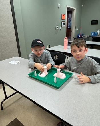 Cloverbuds club members doing science project