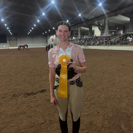 Member Holding a ribbon